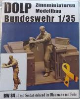 Thumbnail DOLP BW84 SOLDIER STANDING IN OVERALLS WITH FILE
